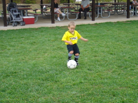 Adam playing soccer