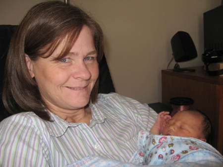 Holding Grandchild #2