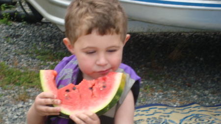 Luke enjoying watermelon