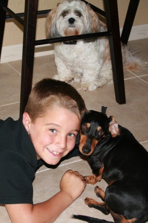 Taner with our dogs Reese & Bandit