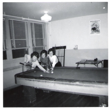 Three WAF playing pool.