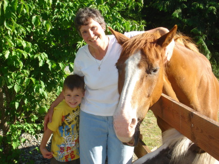 Grandson Nick from Japan, me and my horse, Leo