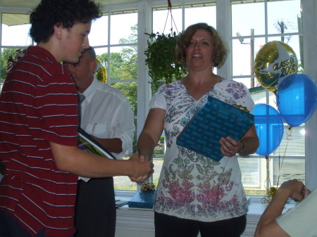 Alex getting his diploma