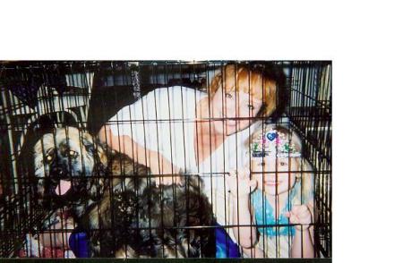 W grandgirl and pet jacque in dog cage LOL
