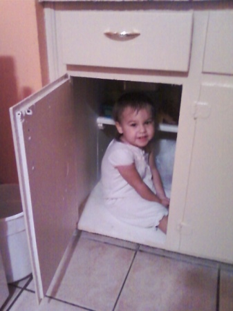 Emma Lisa In Kitchen cabinet