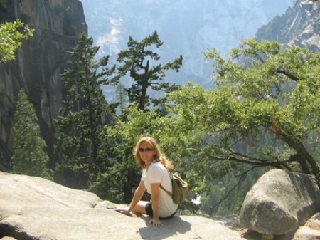 my wife violet sitting on a ledge in yosemite