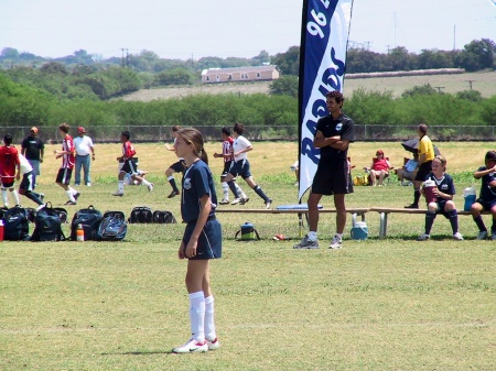 Courtney playing soccer