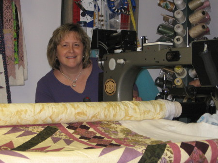 Laura, Sept 2008, Quilting with her Long Arm