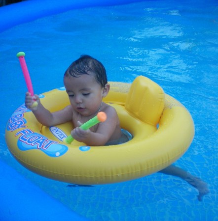 HAVING FUN IN GRANDMA'S POOL