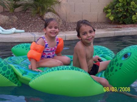 Our kids in our pool
