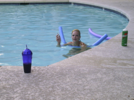 Tasha relaxing in pool