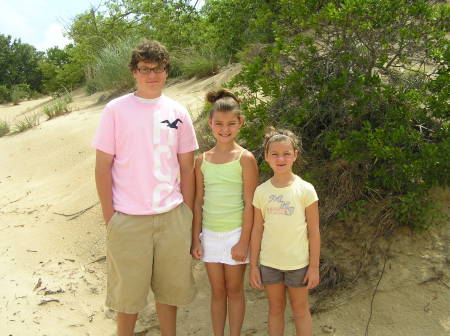 all 3 kids on beach