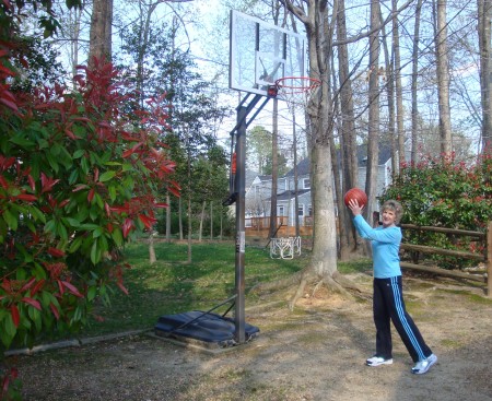 4-2011 Louise playing basketball in driveway