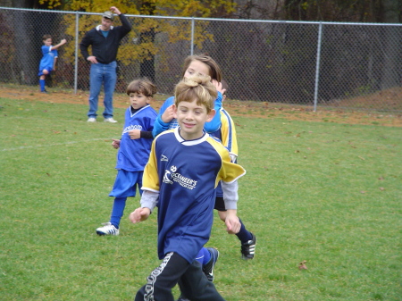 Buddy Boy playing soccer