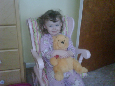 Abby in her PJ's with favorite Pooh Bear