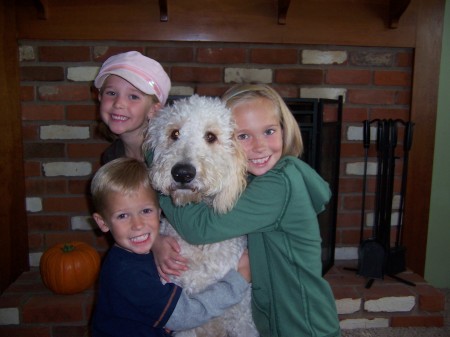 Our three kids and our dog, "Teddy"