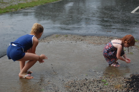 My girls in the rain puddle