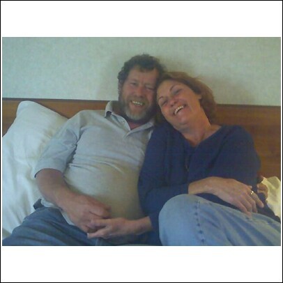 dale and i on our bed at millington inn