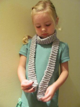 Modeling her new scarf that Mommy made for her