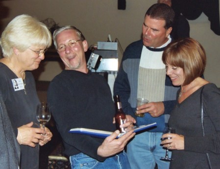 Kim, Steve,Marc and Gail enjoy some old photos