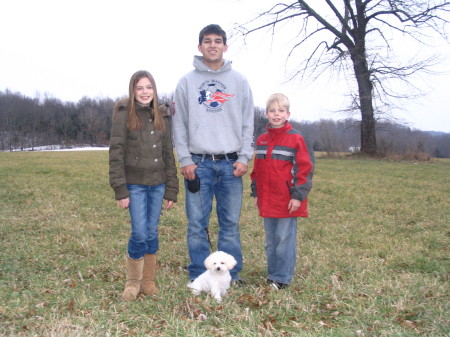 My three kids and our poodle!