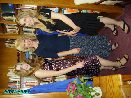 Julie and two daughters, their graduation