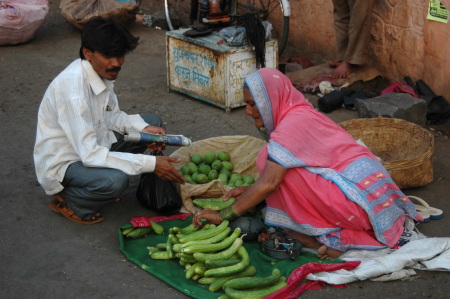 Old woman selling fruit in Kolhapur, India