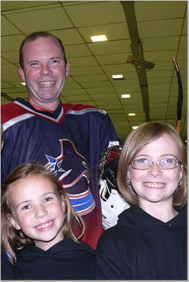 At their Daddy's hockey game