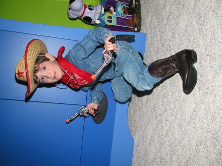 Bryce playing cowboy