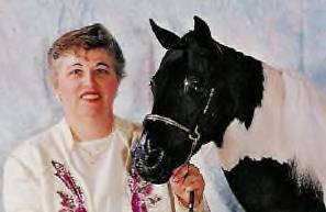 Me with my black pinto stallion, JJ Hot Shot