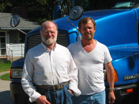 my cousin and I in front of my truck