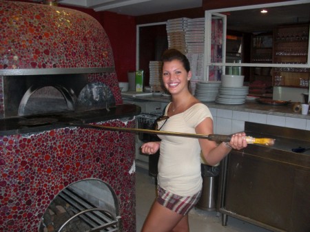 Gina making pizza in Napoli