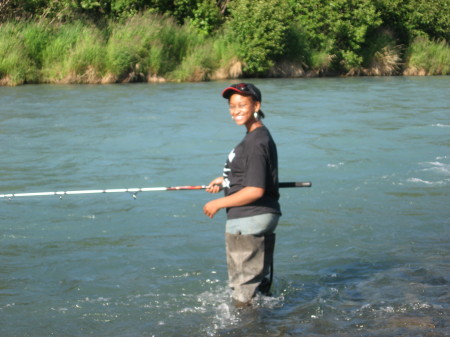 Elysha combat fishing on the river