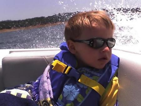 Alex in Daddy's boat