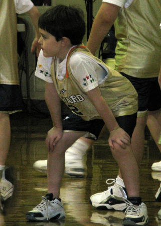 Colby playing basketball