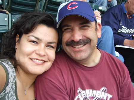 Me and Wifey at a Cubs game. GO CUBS !!!