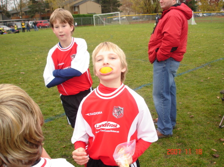 Garrett at soccer (taking a break) 10/07