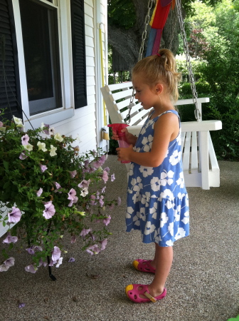 Virginia watering grandma's flowers