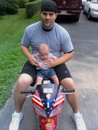 Dad and Brody on the mini-bike