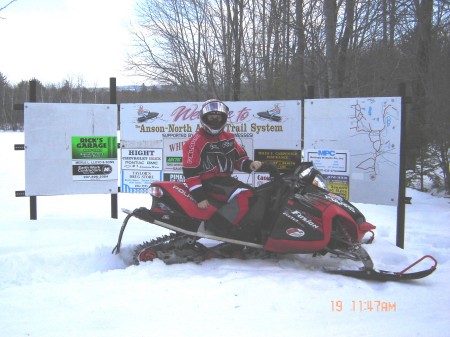 Me on the snowmobile in Maine