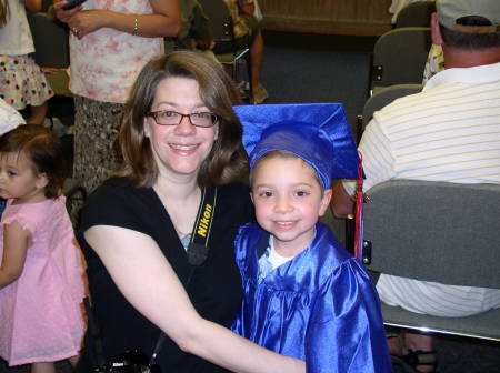 Mom with proud graduate.
