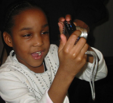 Charity, taking pictures- age 7