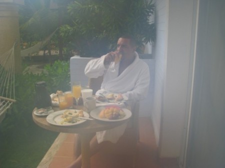 hubby enjoying romantic breakfast outdoors
