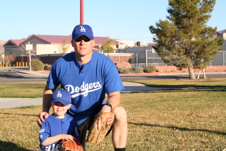 Coaching baseball May 2008. Photo with my son