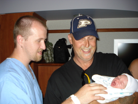 My son Brandon, Grandpa Gregg and Baby Braxton