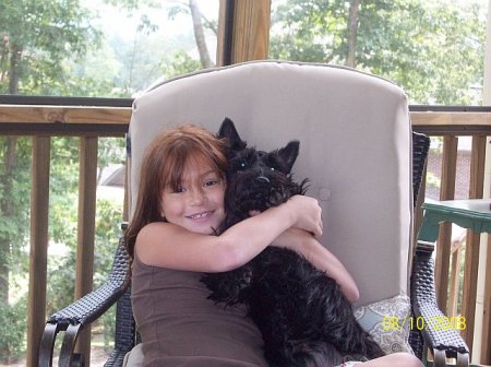 My daughter Peyton and our dog Arthur!