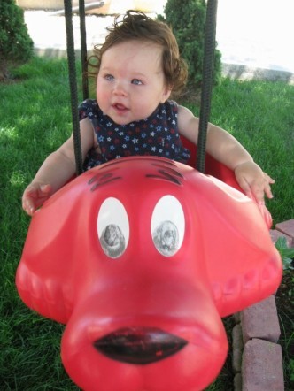 Priya in the Clifford Swing, 6 Months Old