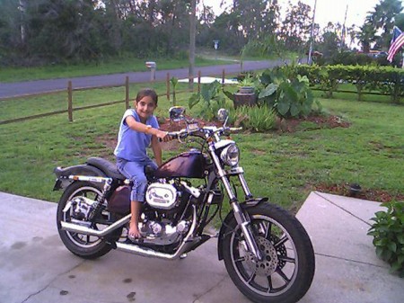 NICK'S LITTLE GIRL ON HER DAD'S BIKE