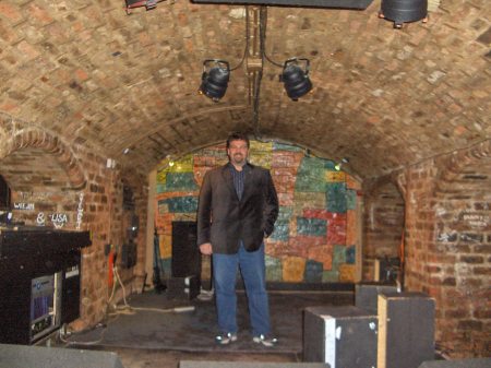Mike on stage at the Cavern Club