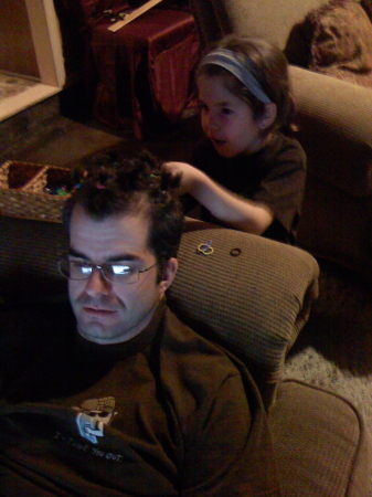 Maddy doing Daddy's hair